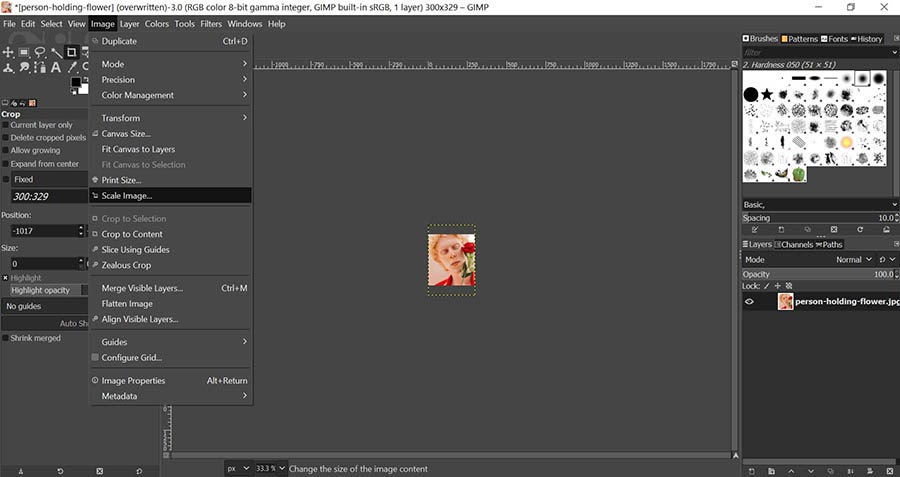 Finding the GIMP menu option for scaling images.